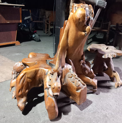 Teak root chair with fish carvings